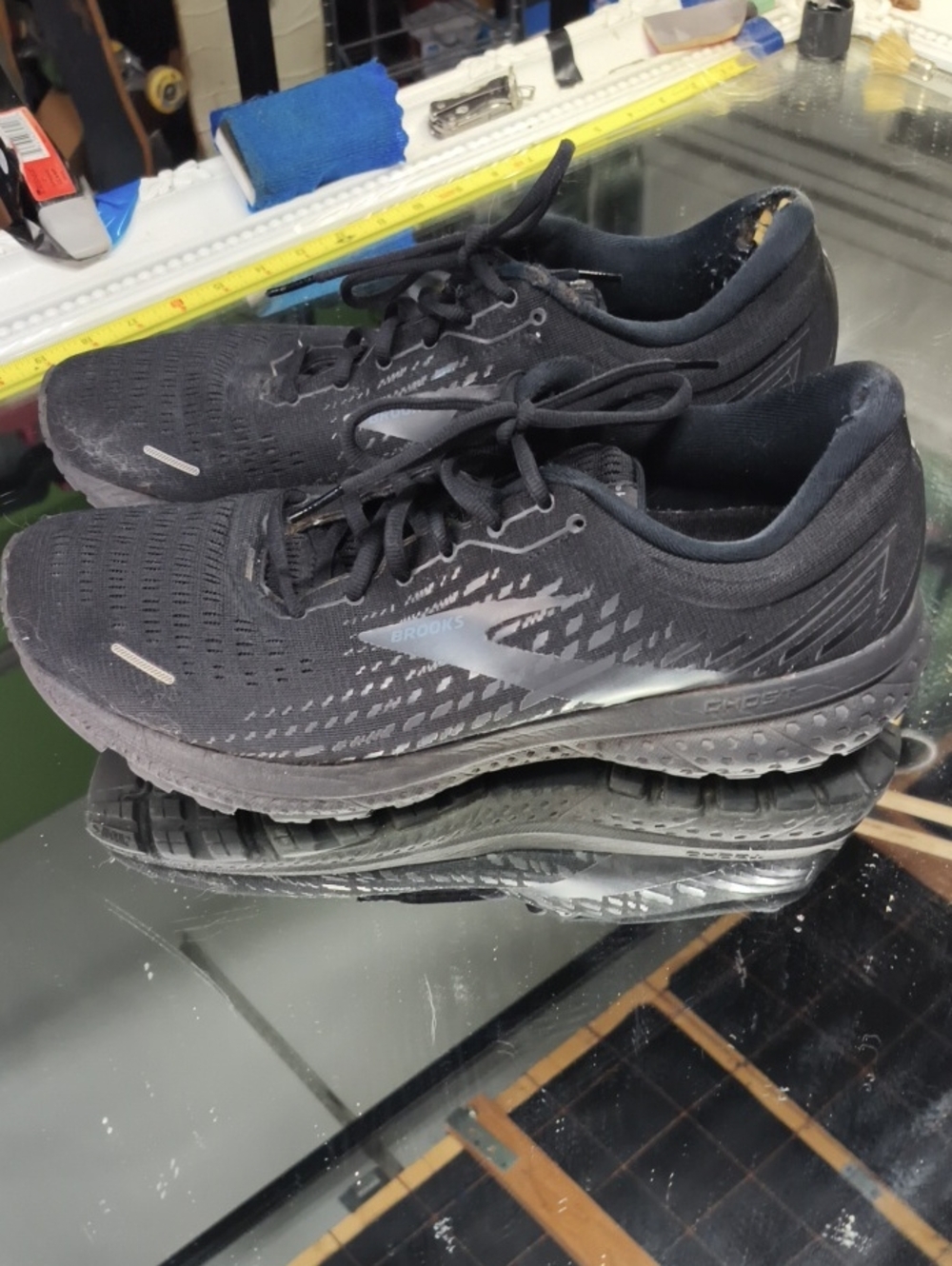 Mens 13 black Brooks Ghost 13 running shoes featuring a reflective silver logo